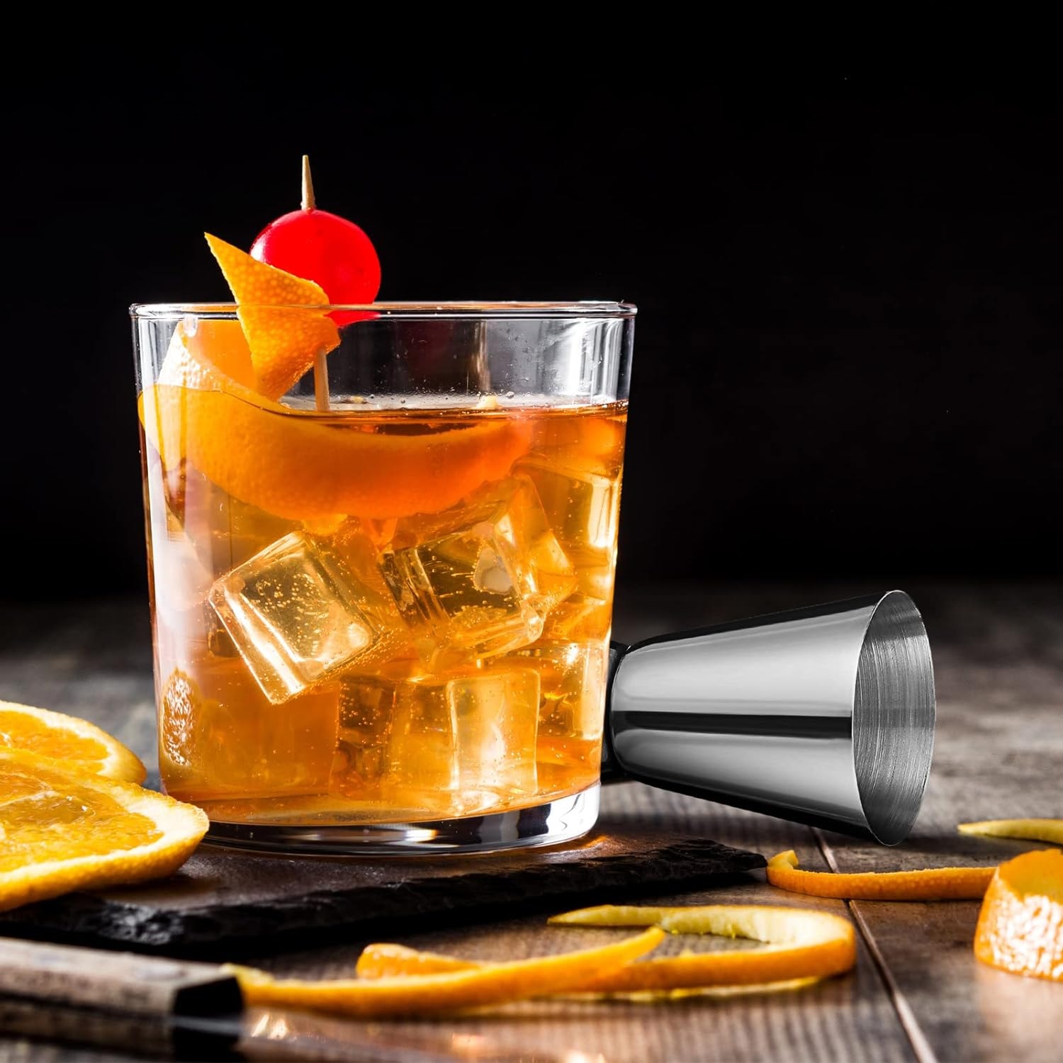 Old Fashioned cocktail with orange peel garnish in a rocks glass
